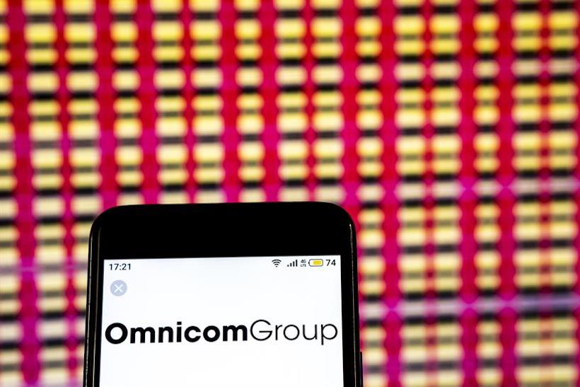 OmnicomMediaGroup logo on smartphone screen