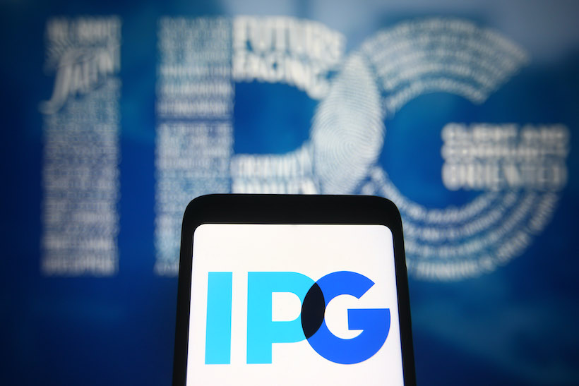 IPG Interpublic Group logo on iPhone screen