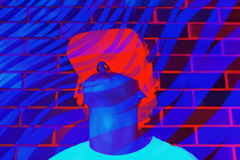 Stylized red and blue picture of man wearing VR headset