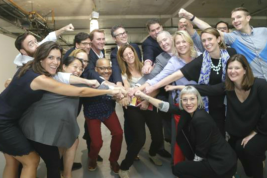 Wendy Clark (left), NA CEO for DDB, celebrates with her team after winning the McDonald's account.