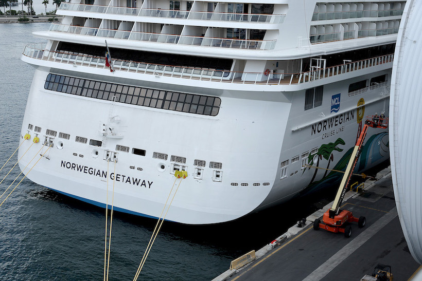 A Norwegian Cruises cruise ship docked at port