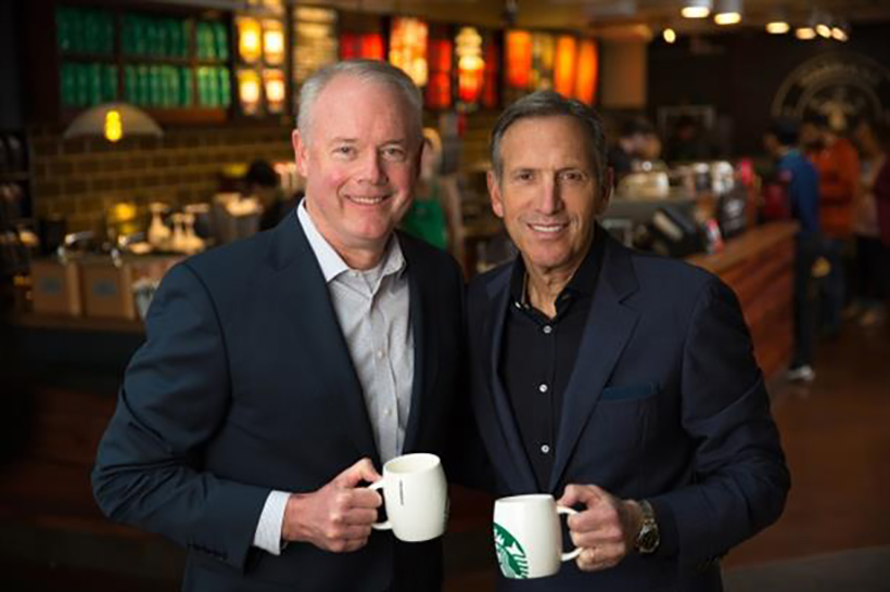Incoming Starbucks CEO Kevin Johnson shares a coffee with his predecessor Howard Schultz