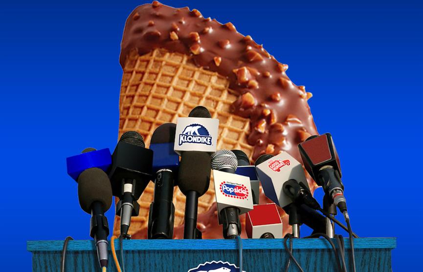 Stock image of the Choco Taco behind a podium