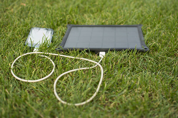Products: Mobile phone with solar powered charger (photograph: Adam Radosavljevic/123RF)