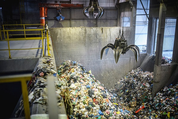 An EfW plant's grabber in action, photograph: Getty Images