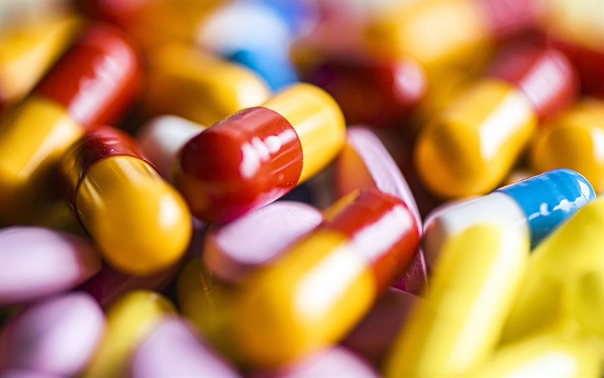 Close up image of multicoloured capsules