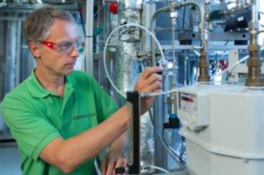 ECN's Bram van der Drift at work on the lab-scale gasification plant. Credit: Jan Buwalda