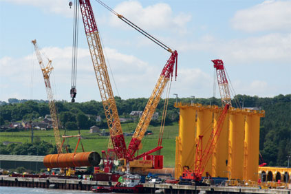 Turbine parts are lifted at the port of Mostyn, Wales, which has been used for work on the North Hoyle and Rhyl Flats wind farms 