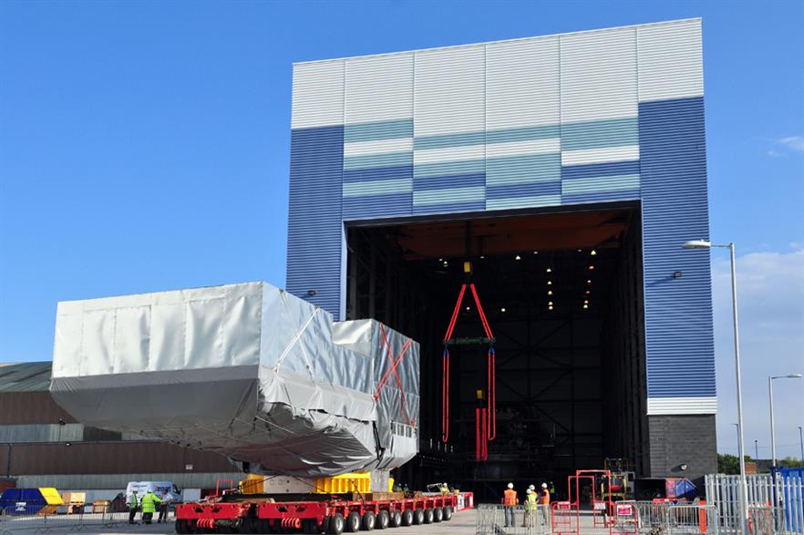 The massive nacelle arrives at the facility