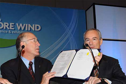 Interior secretary Ken Salazar and Cape Wind president Jim Gordon sign the first offshore wind farm lease