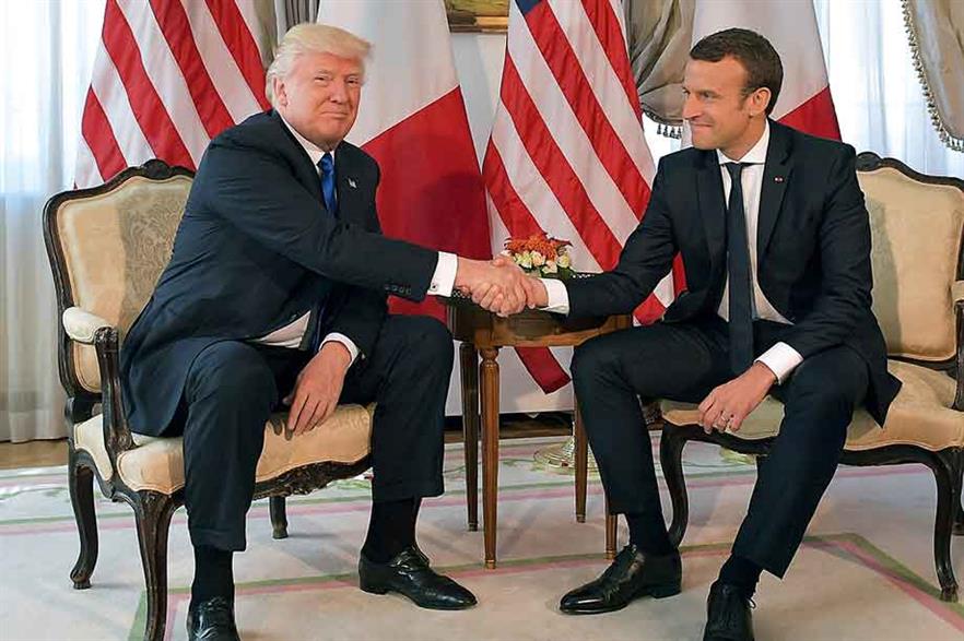 Firm grip… Trump was piqued by losing  handshake showdown with new French president Emmanuel Macron in the week before he pulled the US out of Paris deal (pic:Mandel Ngan/AFP/Getty Images)