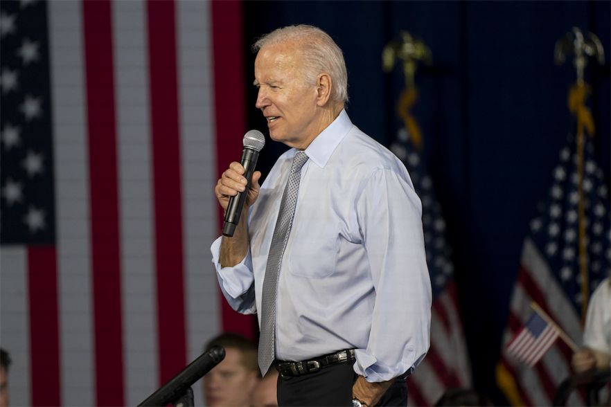 US President Joe Biden signed the climate-boosting Inflation Reduction Act into law in August (pic credit: Nathan Howard/Getty Images)