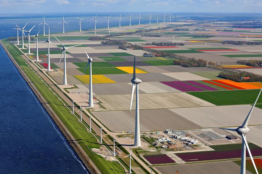 The Enercon 7.5MW turbines beside the original WindMaster 300kW turbines (pic: Klaas Eissens)