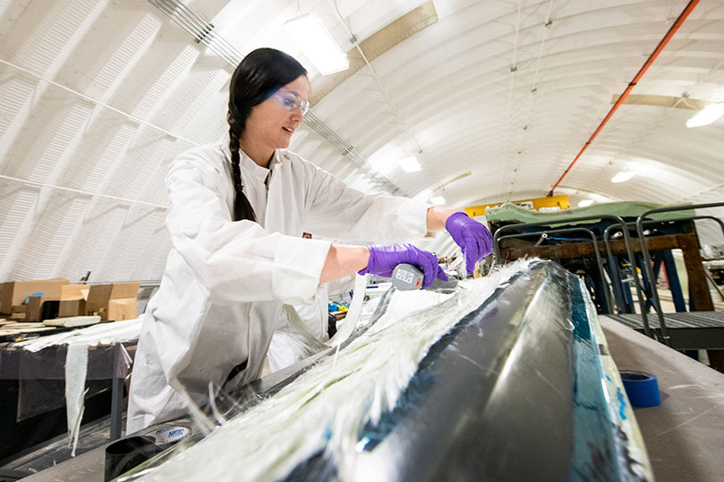 NREL researcher Robynne Murray works on a thermoplastic composite turbine blade (pic: Dennis Schroeder, NREL)