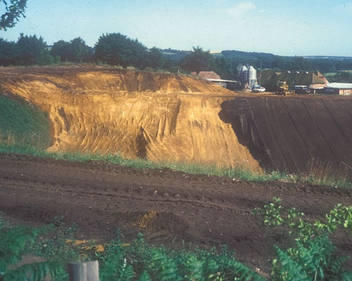 Topsoil materials are put in place as part of the restoration of a sand quarry in Hampshire. Credit: Andy Moffat