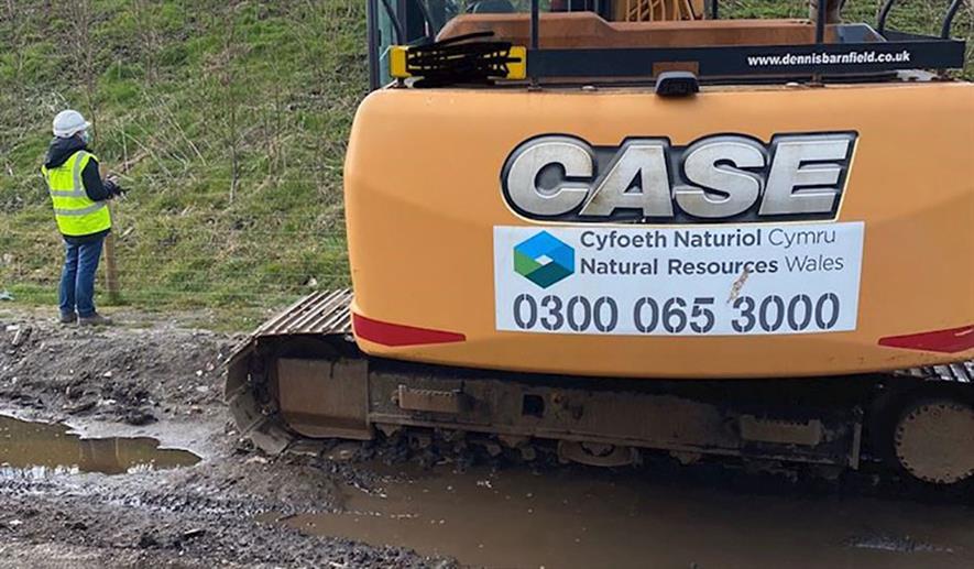 Teams from NRW and environmental consultants are collecting soil samples from the quarry's bund to see if they are contaminated with plastic. Photograph: Natural Resources Wales