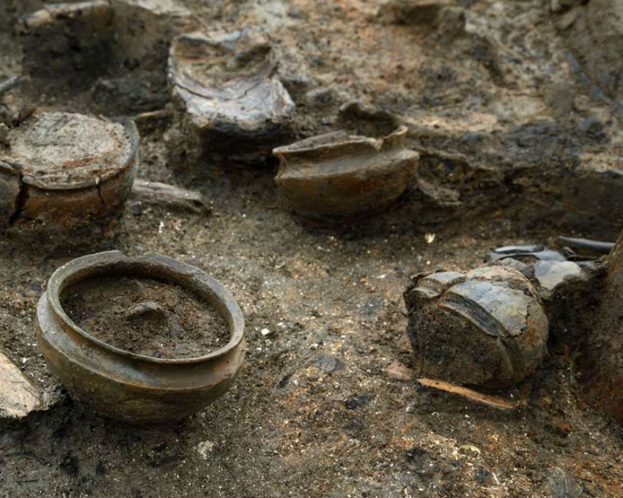 Household items including pots with charred remains of 3,000-year-old food. Picture: Cambridge Archaeological Unit/ Dave Webb