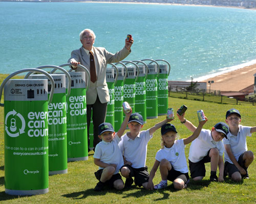 Can crushing machines will be introduced at Weymouth and Portland, Dorset. Ian Roebuck with pupils from Holy Trinity school (photo: Every Can Counts)