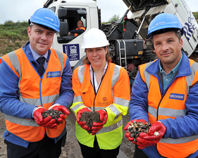 Oxfordshire County Council's Rebecca Harwood (middle) with sweepings. Picture: Grundon