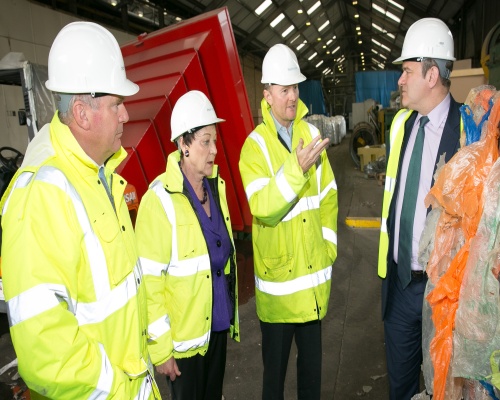 Davey (right) sees waste become recycled pellet and new refuse sack. Picture PlasRecycle