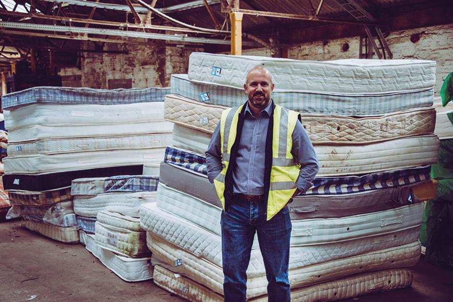 No time to rest: Nick Oettinger and some of the mattresses diverted from landfill. Photograph: Furniture Recycling Group