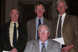 Long Service Award recipients Ron Patrick (left) RFS President Anthony Bosenquet (centre back) Derick Stickler (right) and John Rowe (centre front) - image: Royal Forestry Society