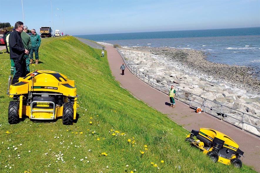 Conwy: two remote-control Spider mowers maintain steep banks along promenades - image: Dvorak