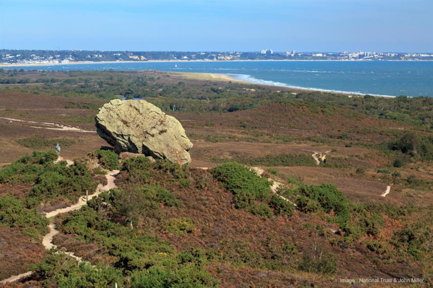 Godlingston Heath with Poole and Bournemouth in the distance - credit: National Trust Images and John Miller