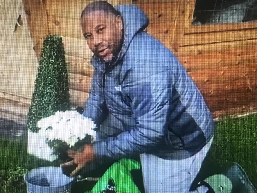 Screenshot from Evergreen Garden Care TV promotion featuring ex-footballer John Barnes