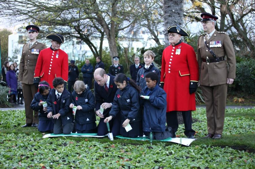 HRH the Duke of Cambridge planting poppies with local children