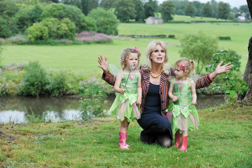 Joanna Lumley with two 'Tinkerbell' fairies in Moat Brae grounds