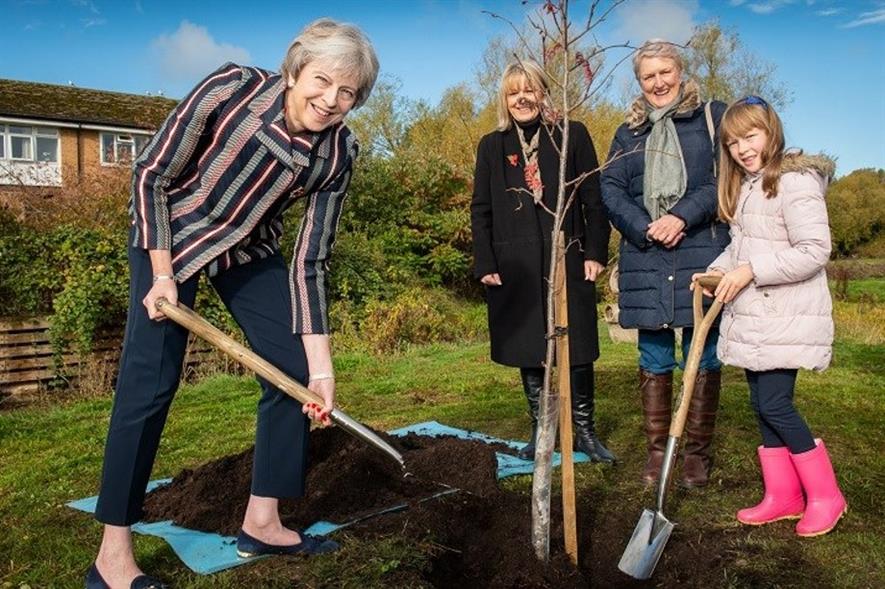 The Prime Minister plants a QCC tree watched by Sainsbury’s Judith Batchelar; Woodland Trust chair Baroness Young and Sofia Davenport, granddaughter to Maidenhead Waterways' Richard Davenport. Image: Martyn Milner Photography