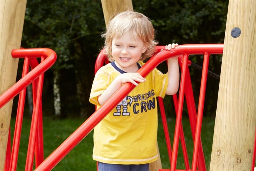 A child enjoys the new play area. Image: Sutcliffe Play