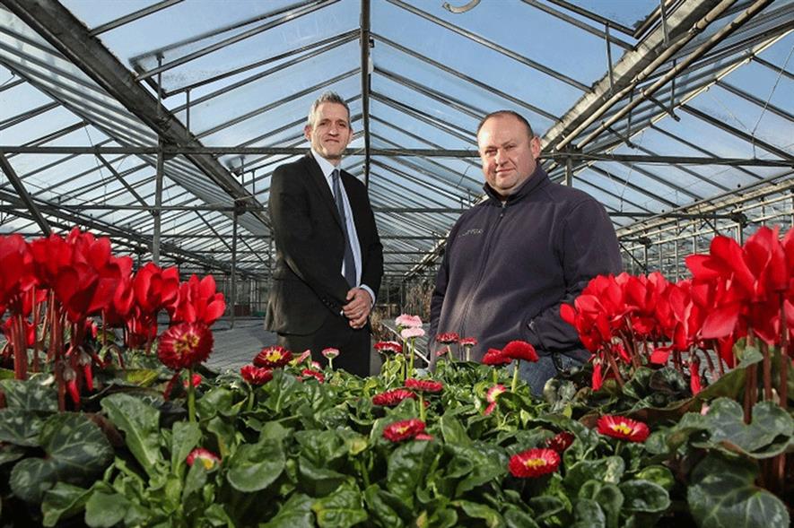 Ulster Bank business development manager Paul Reid (left) pictured with Wilderness Flower & Garden Centre owner Kyle Archer