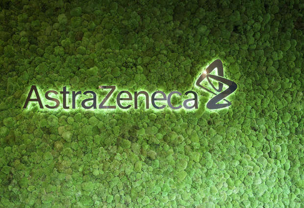 AstraZeneca logo on a green living wall