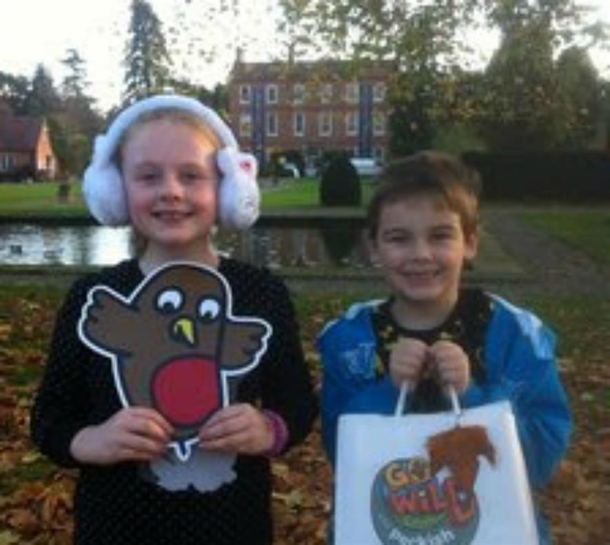 Jasmine (aged 8) and Jaiden (aged 7) with their Go Wild With Peckish goodies after completing the activities at Burford House Garden Store in Worcestershire.