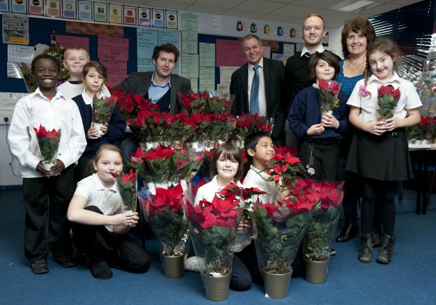 Greg Hill (back centre) with schoolchildren and Sun garden writers Steve and Val Bradley