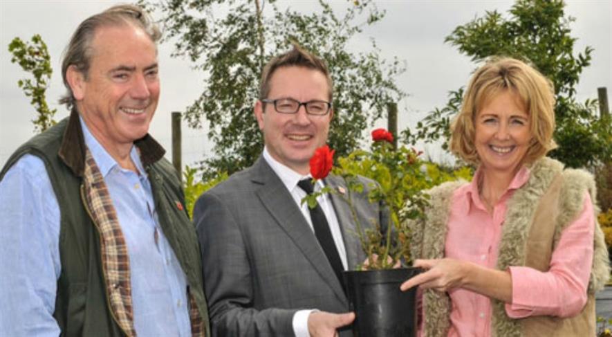 Dr Stephen Clarke, Head of Remembrance at The Royal British Legion, is pictured with Frances and Julian de Bosdari, owners of Ashridge Nurseries in Castle Cary, Somerset.