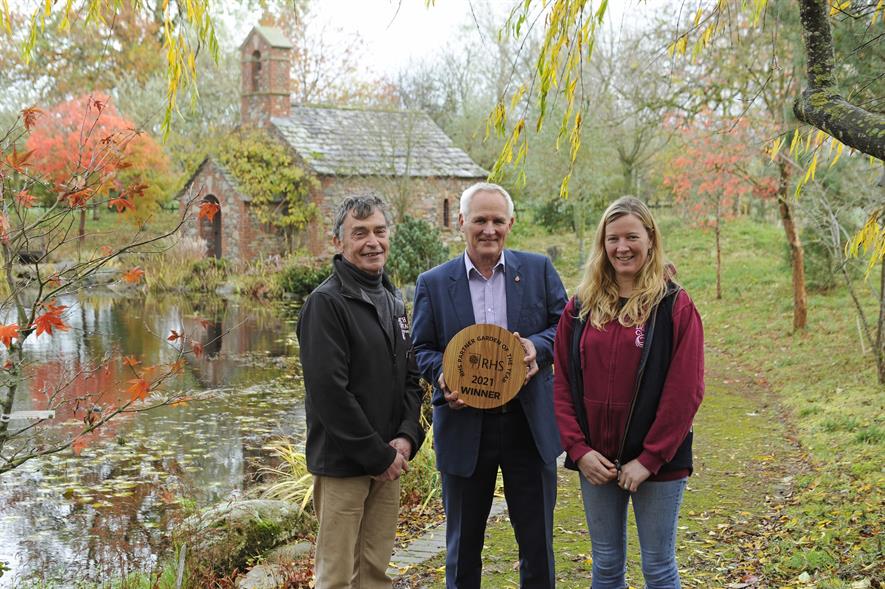 Peter and Jo Stott of Larch Cottage Nurseries receive a plaque commemorating their RHS Partner Garden of the Year award from RHS Head of Horticultural Relations, Chris Moncrieff.  Image copyright Val Corbett Photography