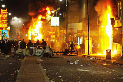 London riots: more than 100 people arrested