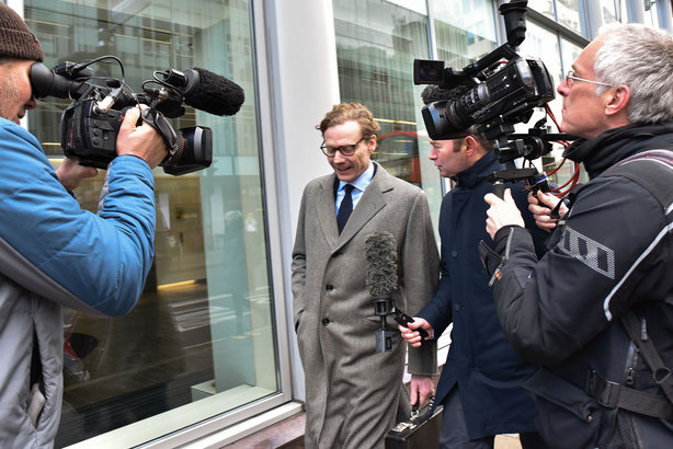 Cambridge Analytica boss Alexander Nix is mobbed by journalists ahead of his suspension as CEO (pic credit:Matthew Chattle/REX/Shutterstock)