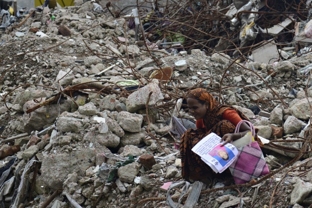 Global fashion labels found their reputation buried along with the factory workers who used to make their garments at Rana Plaza. Here a woman grieves at the loss of a loved one who died in the 2013 factory collapse. (Pic: AFP)