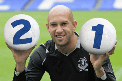Celebration: Everton goalkeeper Tim Howard