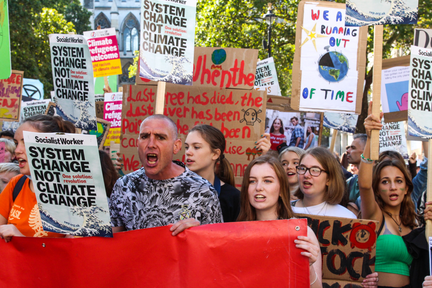 Ready made Socialist Worker placards were in abundance at last week's climate strike. Photo: A Hickman.