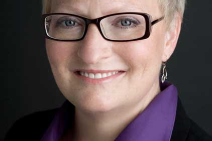 Anna Cahill Leonard: president of AxiCom US