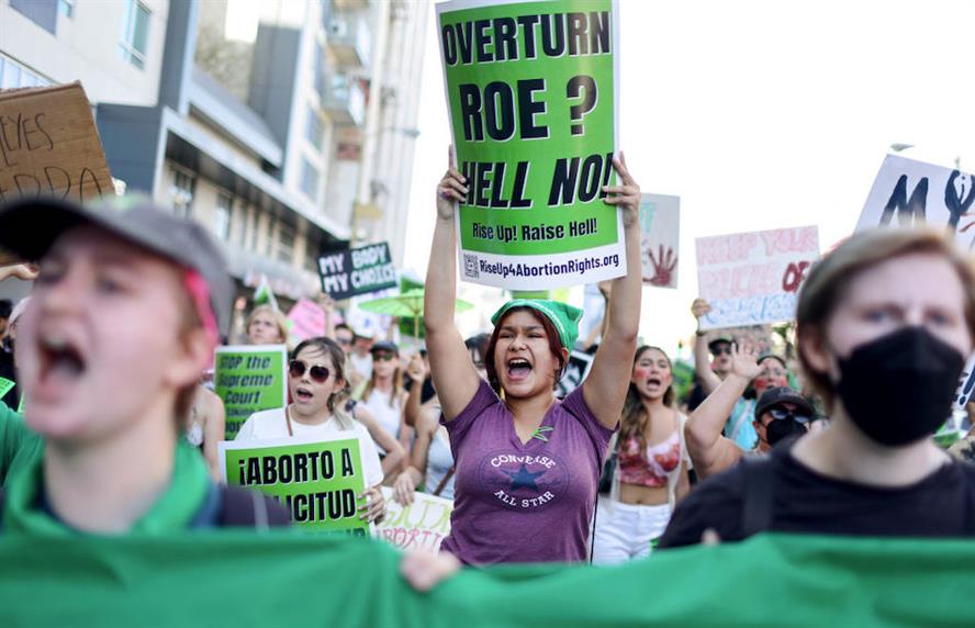 Abortion rights supporters holding signs