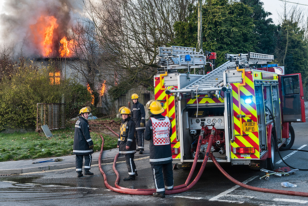 Firefighters tackle a house fire (Pic credit: Alex Ramsay / Alamy Stock Photo)