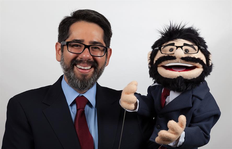 Cabrera and his Muppet twin, Mupano.