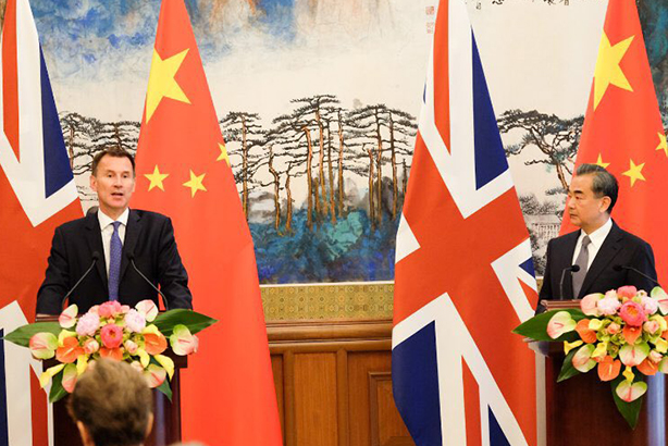 Foreign Secretary Jeremy Hunt (left) with Chinese counterpart Wang Yi (image via @Jeremy_Hunt on Twitter)