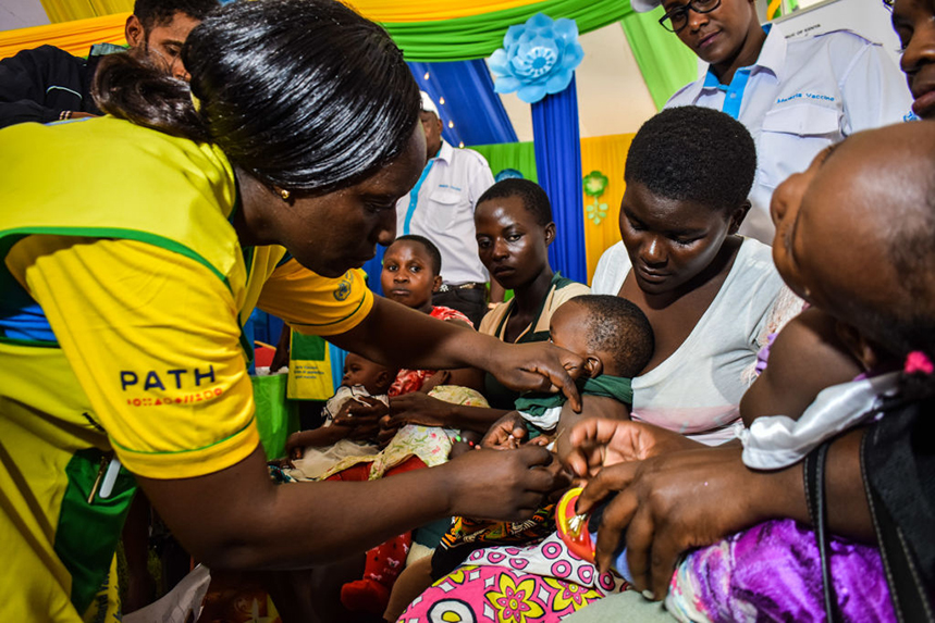 A health worker vaccinates a child against malaria – one of the diseases it is Glide's mission to eliminate (Photo: Getty Images)